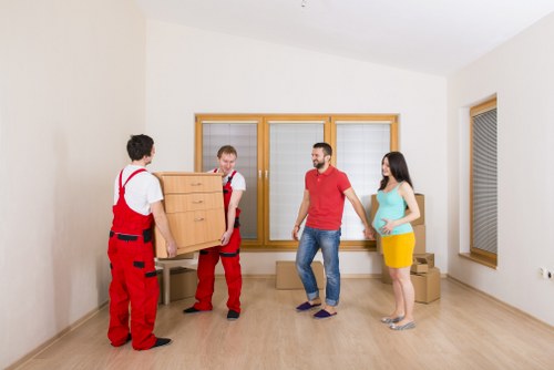 Local office relocation team handling desks and equipment near Kingston upon Thames