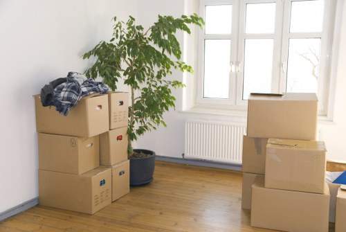 Loading household items into a van for a local move in Kingston upon Thames