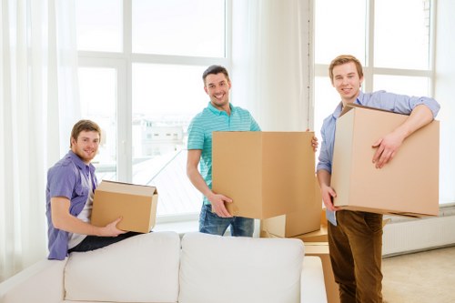 Careful loading of unwanted furniture from a flat in Kingston upon Thames