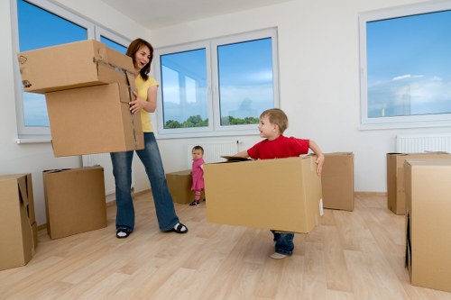 Packed boxes and removal van for a Kingston home relocation