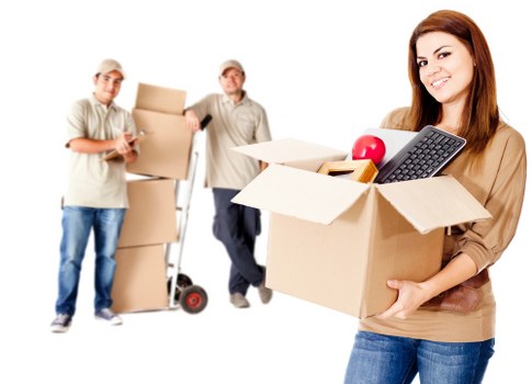 Movers preparing fragile and bulky items for transport in Kingston