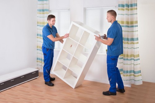 Moving day checklist and household boxes in a Kingston property